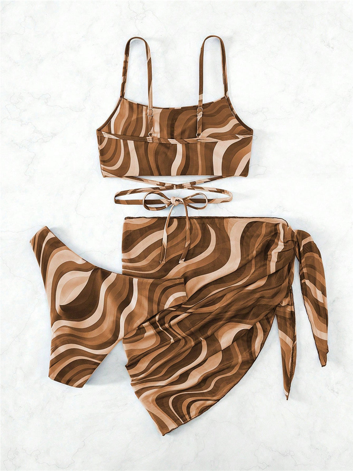 Tied Printed Three-Piece Swim Set featuring a stylish design with removable padding and moderate stretch fabric, perfect for summer wear.