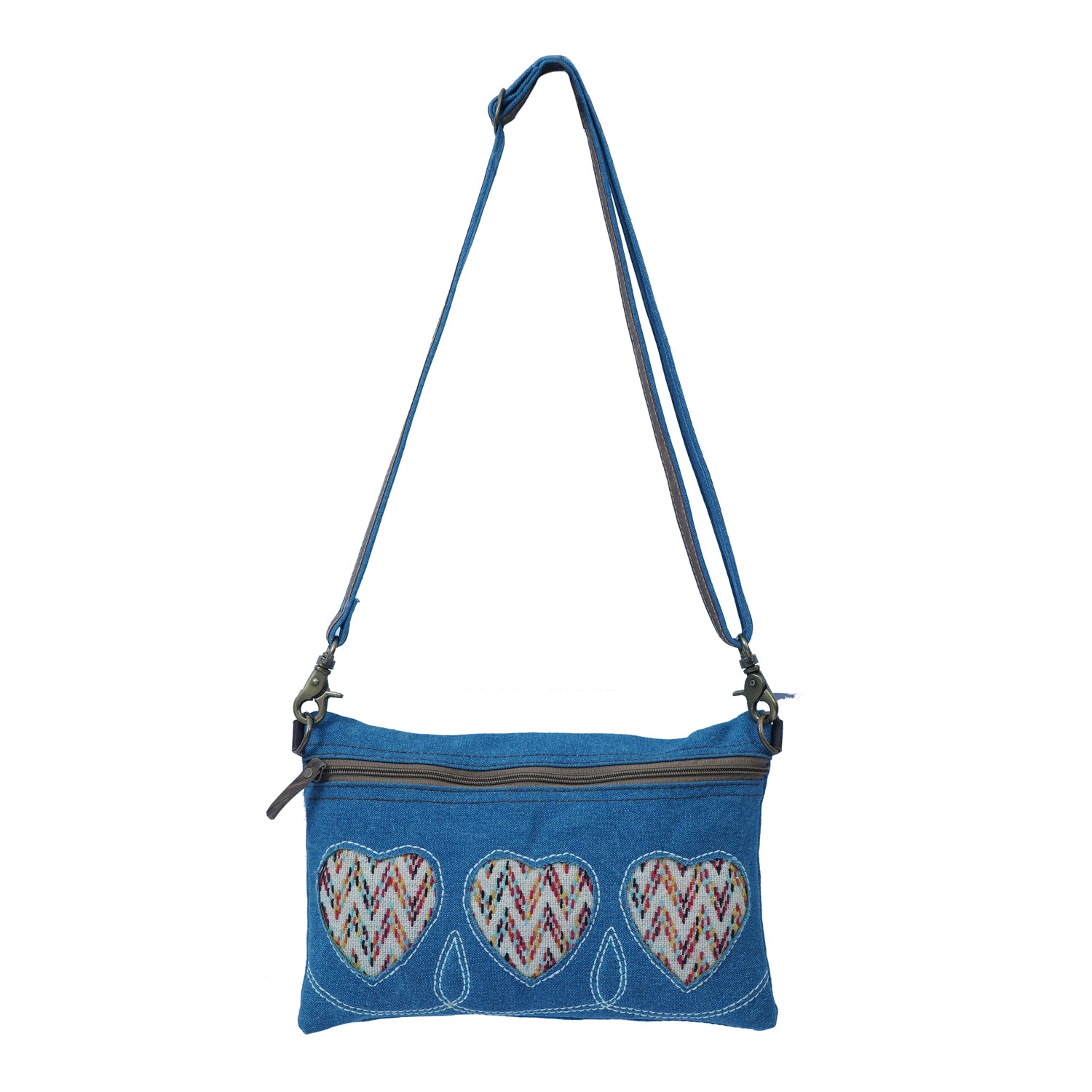 Titod Crossbody Bag made of denim, cotton, and leather, showcasing its elegant and trendy design.