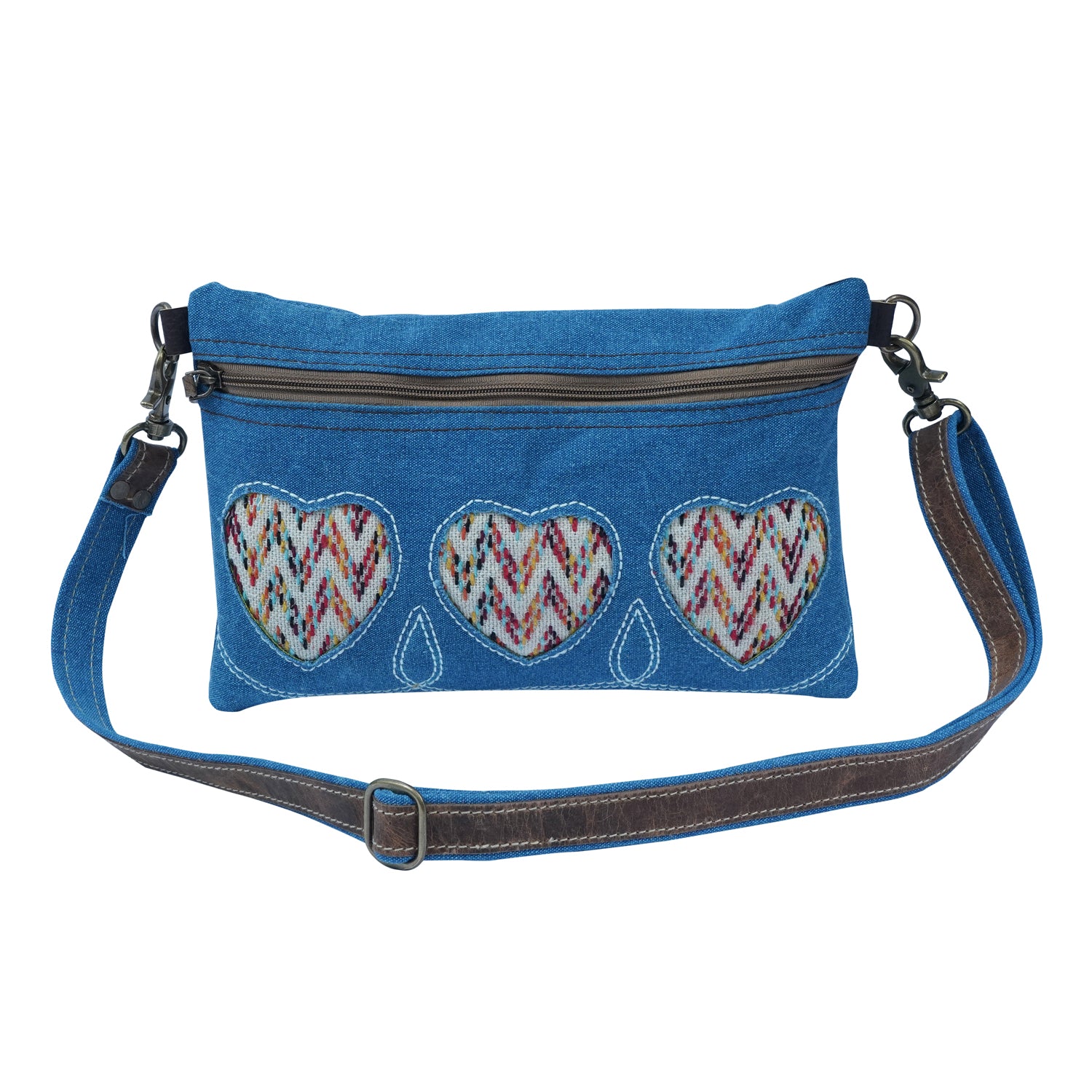 Titod Crossbody Bag made of denim, cotton, and leather, showcasing its elegant and trendy design.