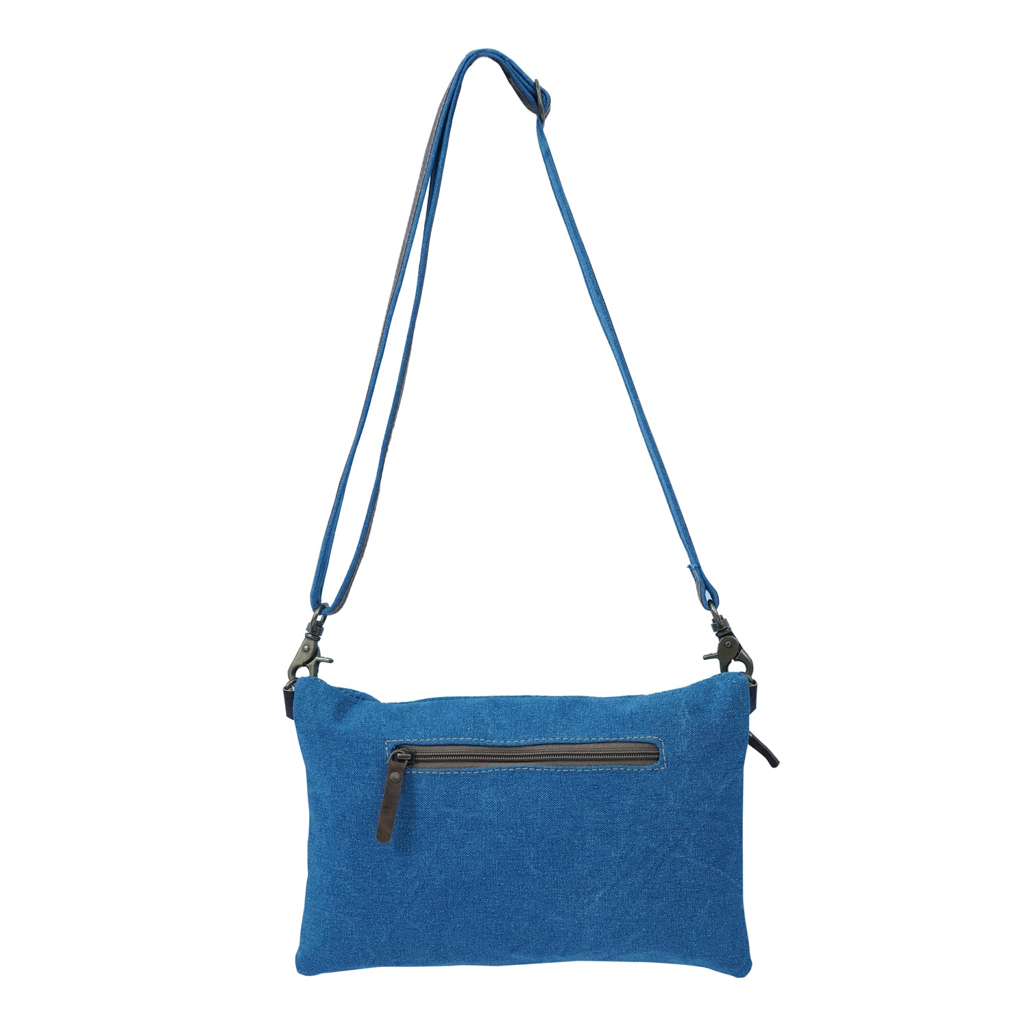 Titod Crossbody Bag made of denim, cotton, and leather, showcasing its elegant and trendy design.