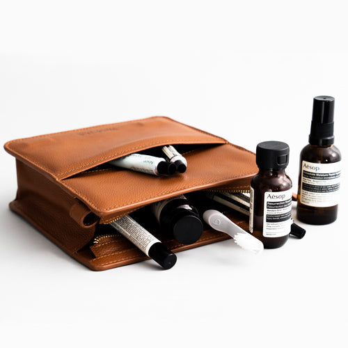 A stylish and compact Toiletry Kit with multiple compartments, ideal for travel and organization.