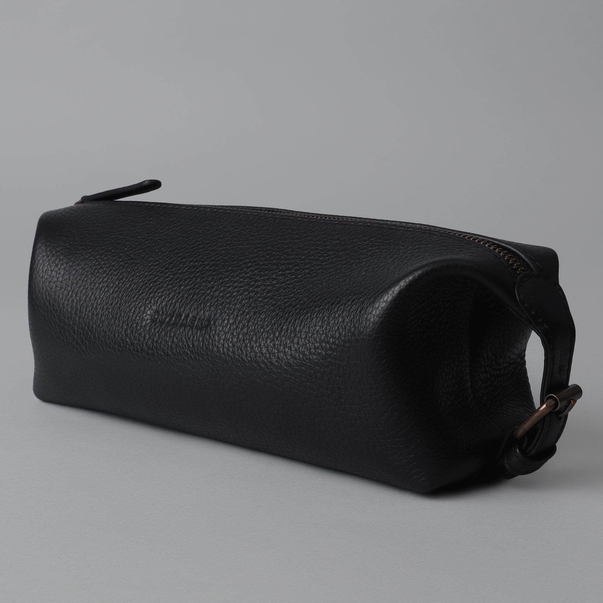 Tokyo Toilet Bag made from premium full grain leather, featuring a spacious interior and zipper pocket, designed for toiletries.