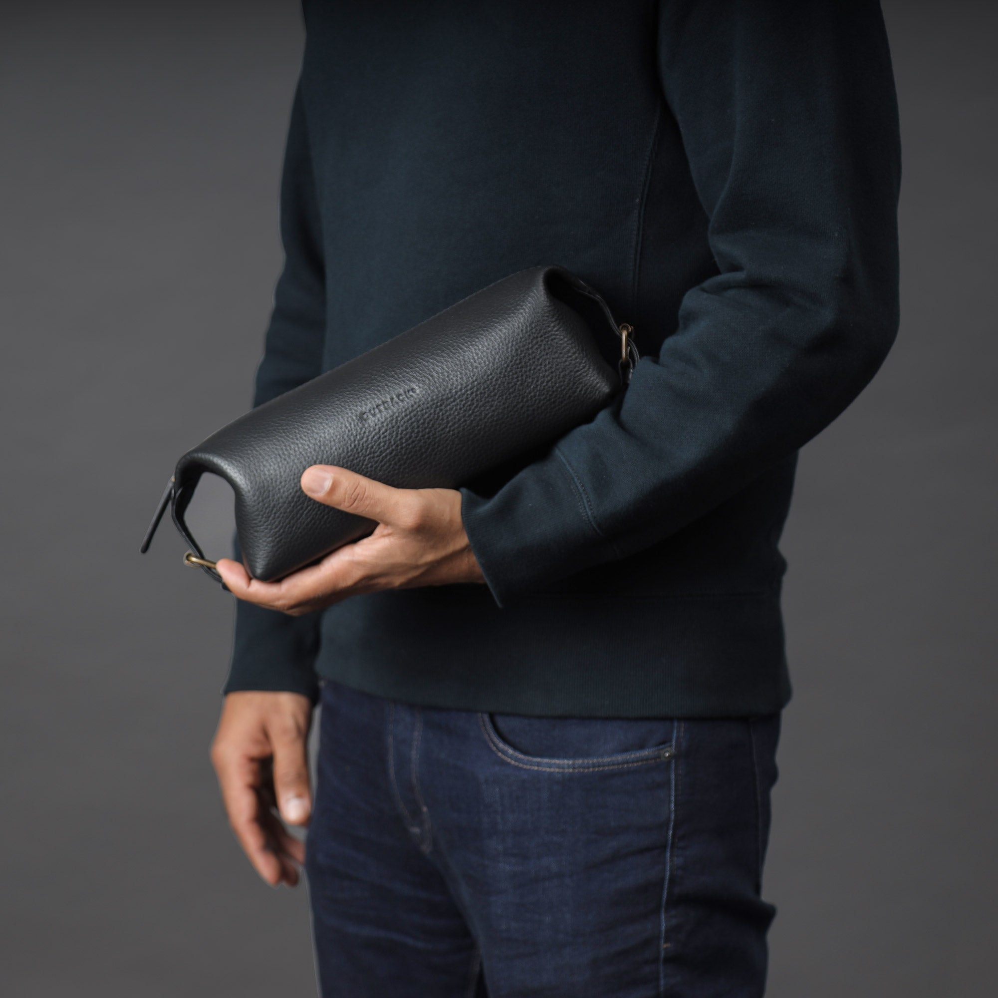 Tokyo Toilet Bag made from premium full grain leather, featuring a spacious interior and zipper pocket, designed for toiletries.