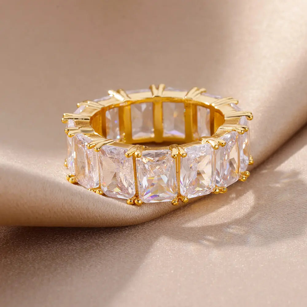 Trendy Crystal Gold Plated Ring featuring geometric design and crystal accents, crafted from stainless steel.