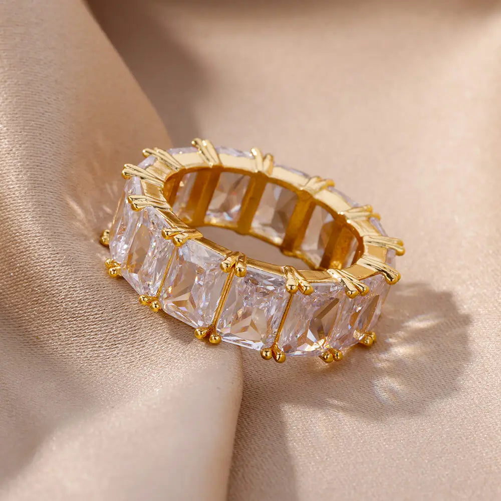 Trendy Crystal Gold Plated Ring featuring geometric design and crystal accents, crafted from stainless steel.