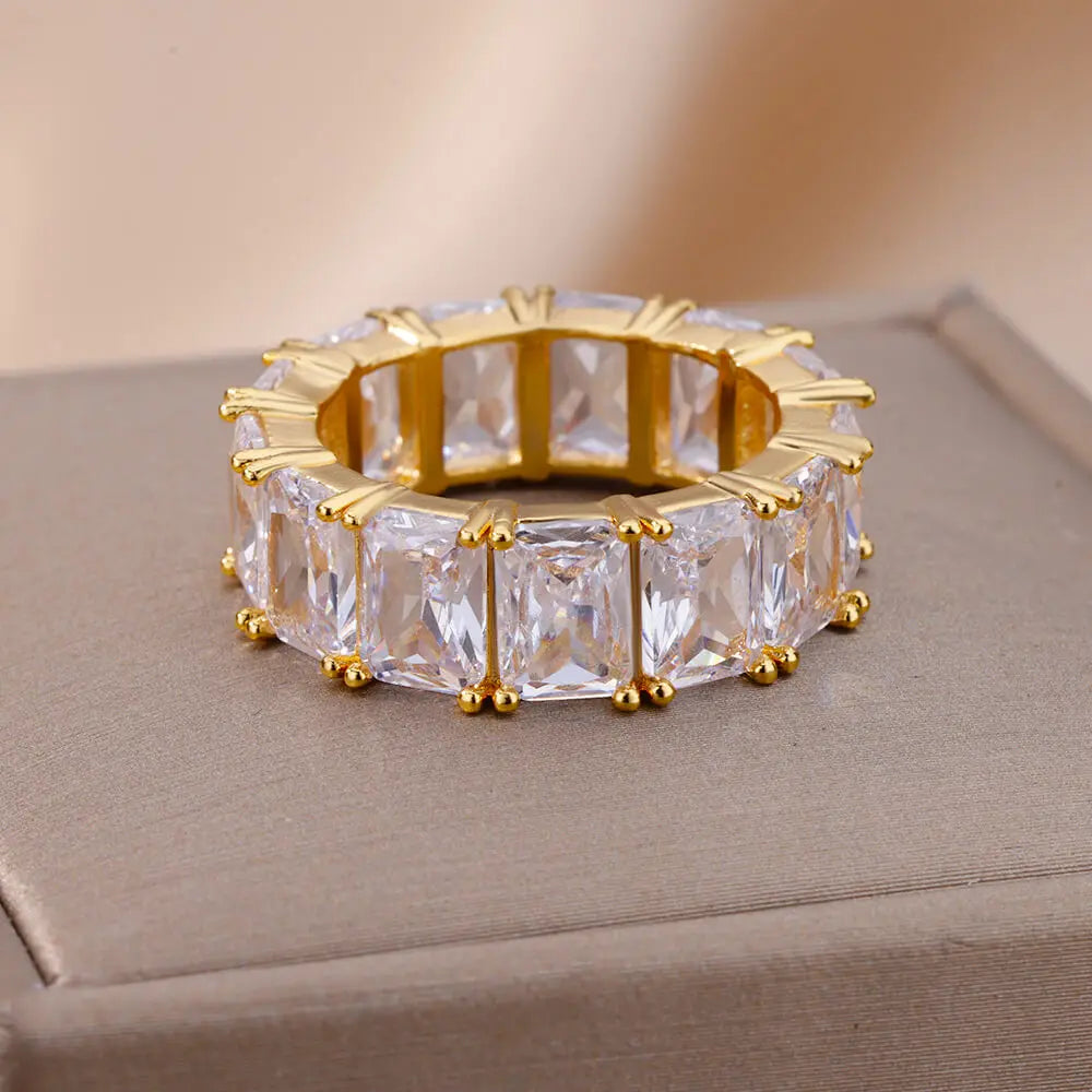 Trendy Crystal Gold Plated Ring featuring geometric design and crystal accents, crafted from stainless steel.