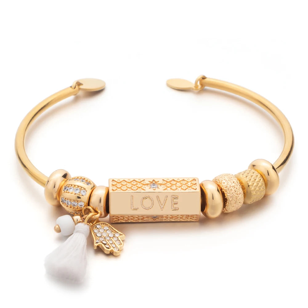 Trendy Engraved Love Charm Bracelet made of zinc alloy with a beaded design, featuring an engraved 'LOVE' charm.