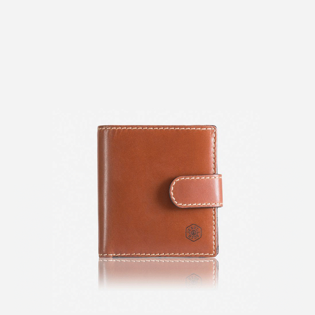 Tri Fold Wallet in Clay color with zipped coin pouch, showcasing its compact design and stylish appearance.