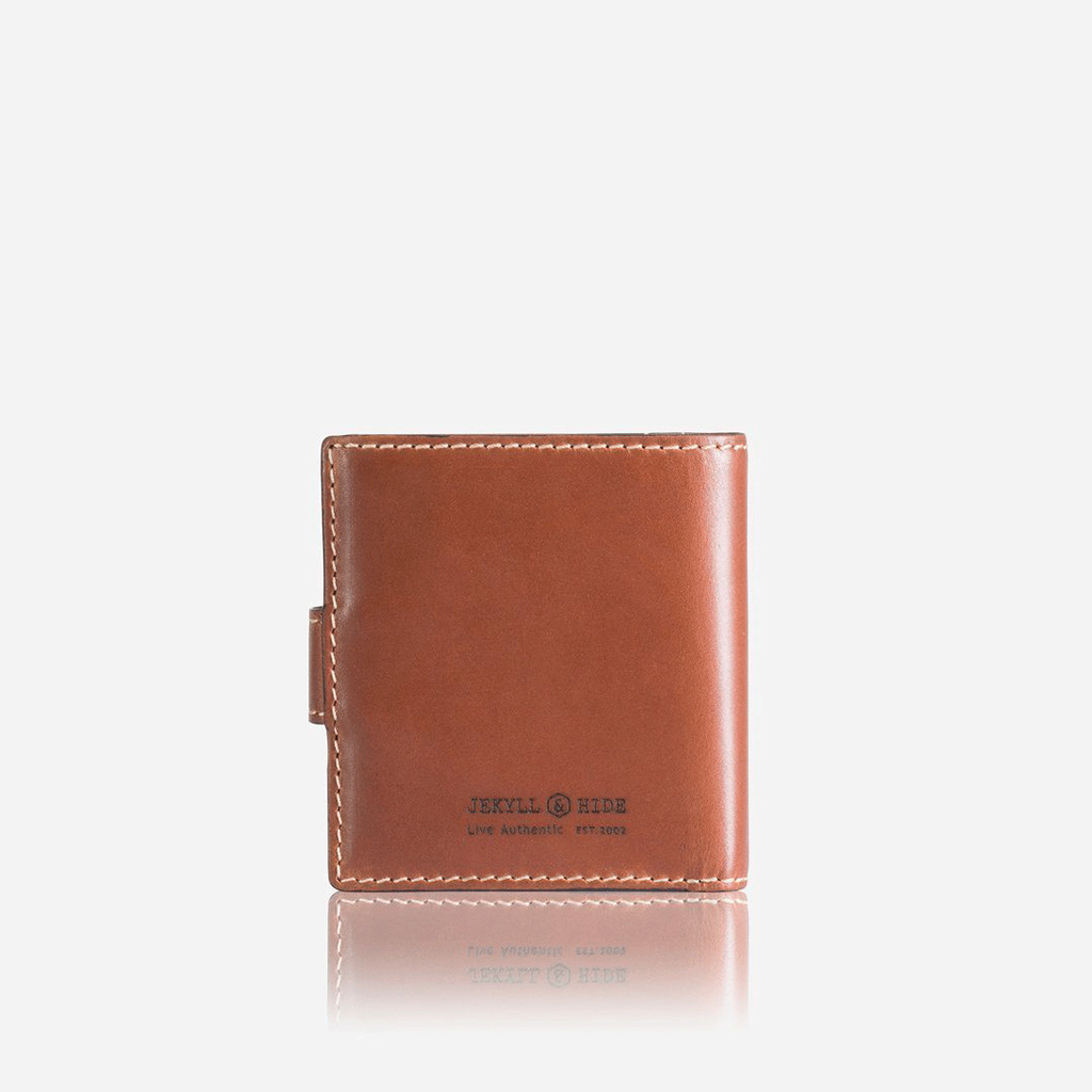 Tri Fold Wallet in Clay color with zipped coin pouch, showcasing its compact design and stylish appearance.