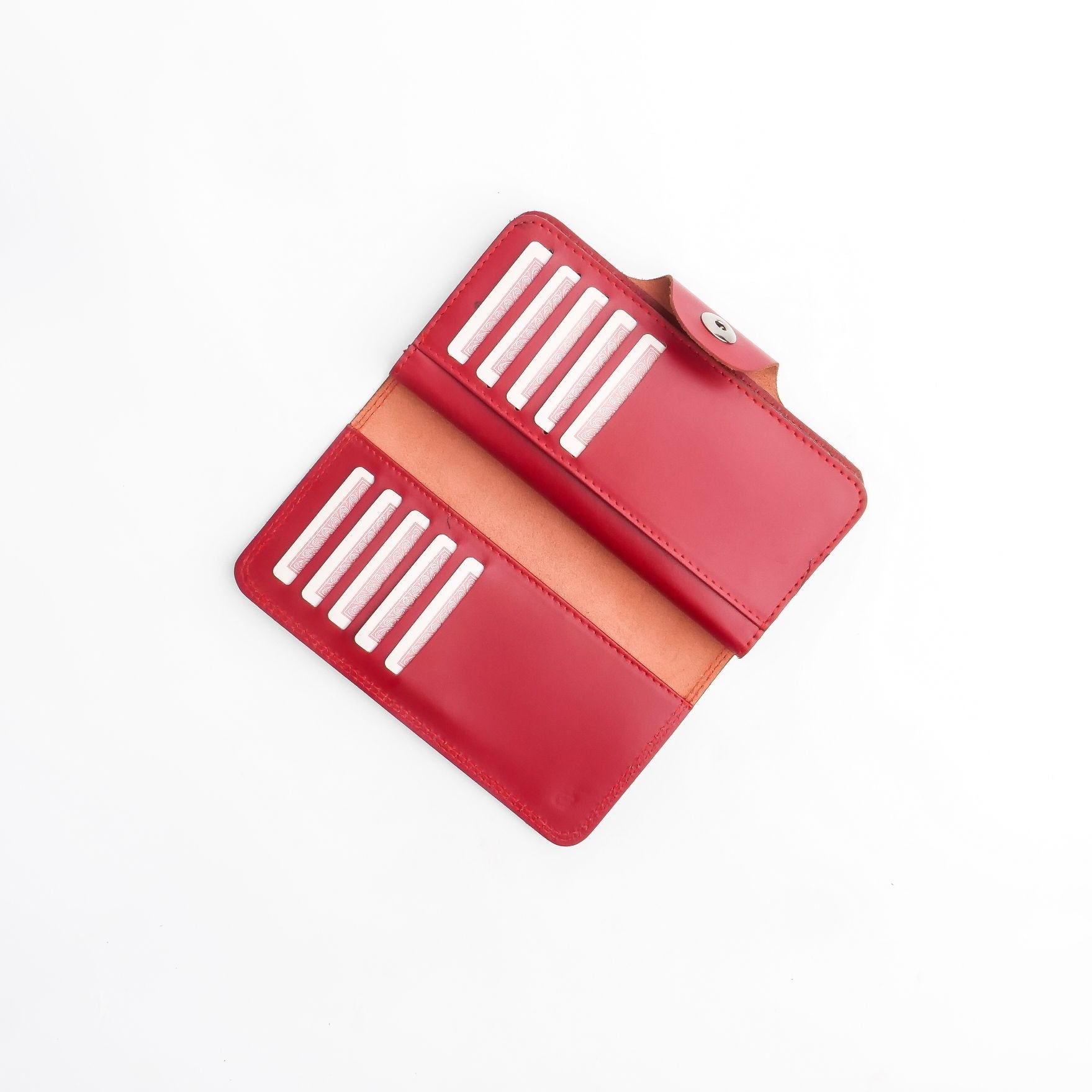 Tri-Fold Pure Leather Long Wallet in red with button closure, showcasing multiple compartments and card slots.