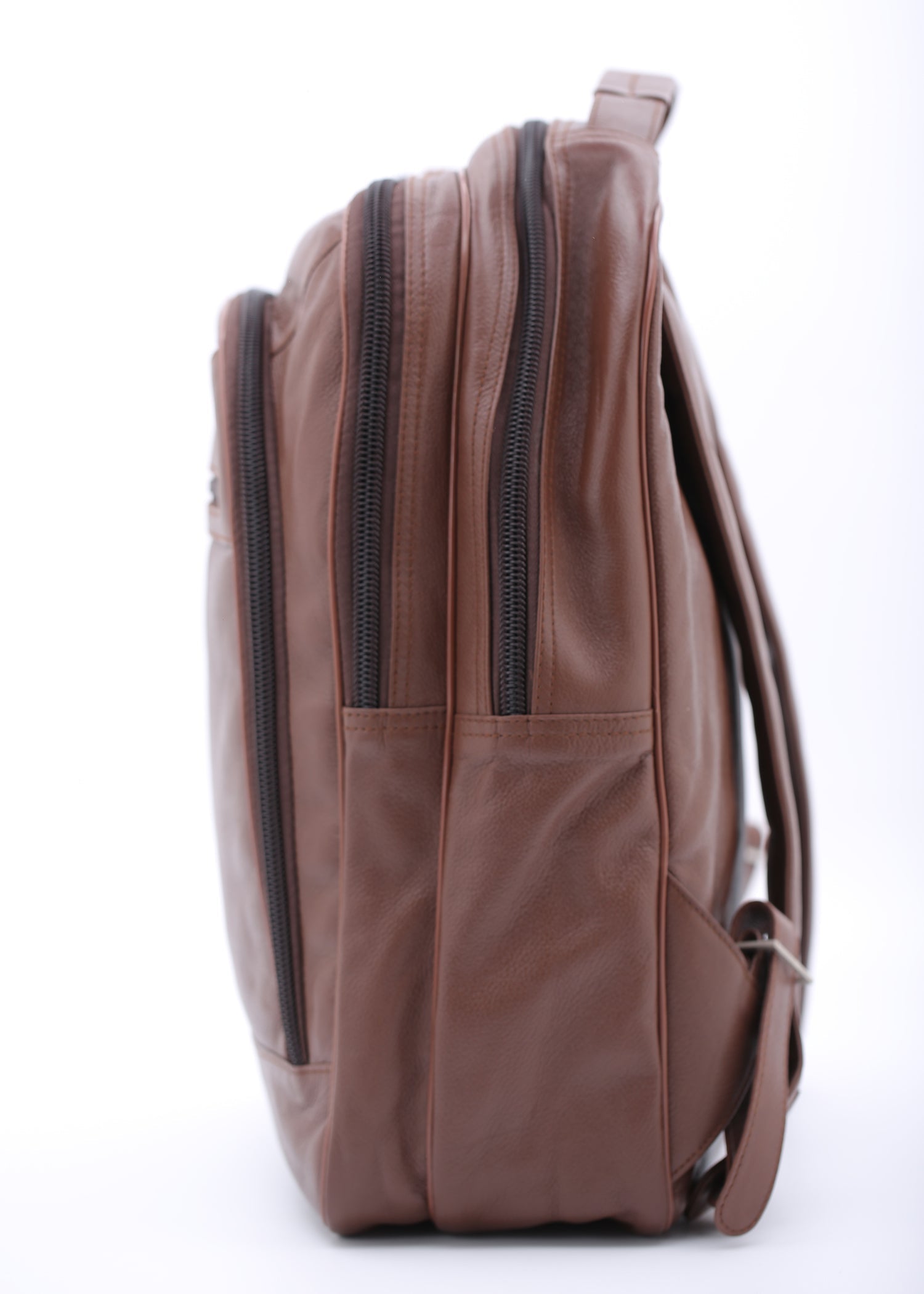 Trio Leather Backpack in TAN color, showcasing premium cowhide leather, three zip compartments, and adjustable padded shoulder straps.