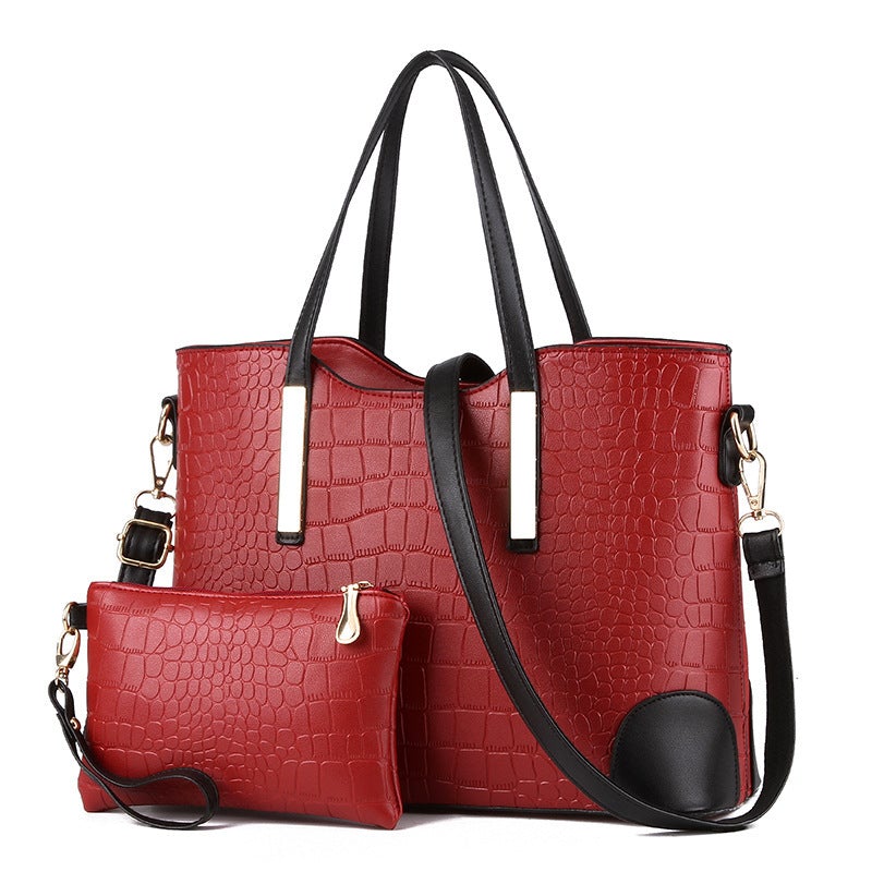 Two-Piece European and American Style Fashion Shoulder Bag in wine red, featuring a trendy stone pattern and soft handles.