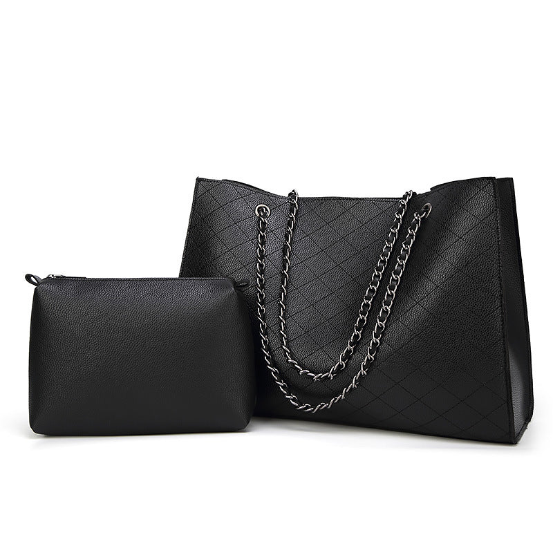 A stylish two-piece single-shoulder chain bag in black, featuring a trendy design with a horizontal square shape and gold chain detail.