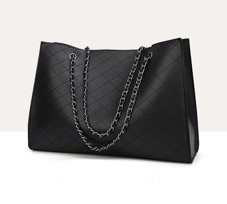 A stylish two-piece single-shoulder chain bag in black, featuring a trendy design with a horizontal square shape and gold chain detail.