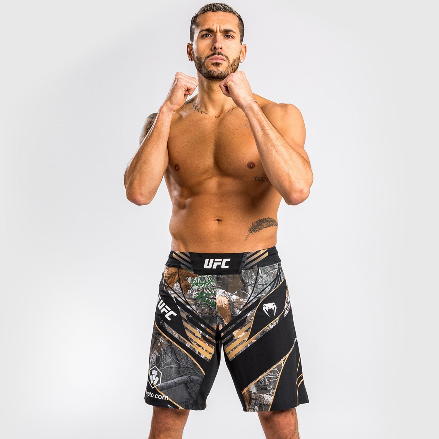 UFC Authentic Fight Night REALTREE Camouflage Fightshorts by VENUM featuring a unique camouflage pattern and elastic waistband.