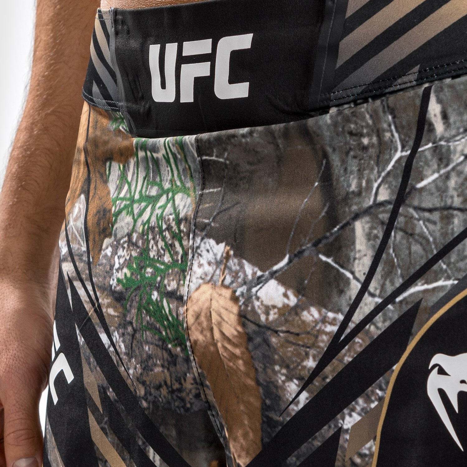 UFC Authentic Fight Night REALTREE Camouflage Fightshorts by VENUM featuring a unique camouflage pattern and elastic waistband.