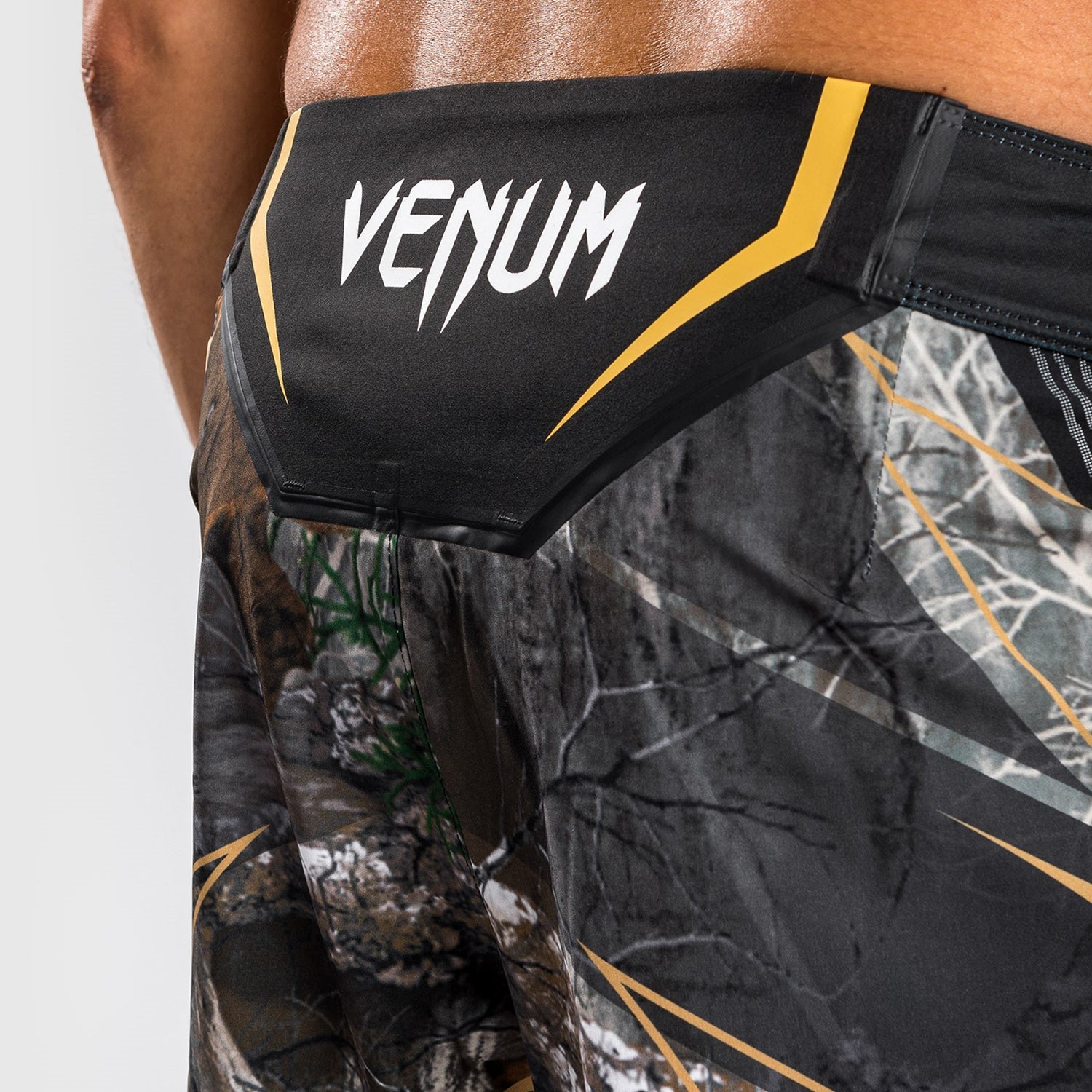 UFC Authentic Fight Night REALTREE Camouflage Fightshorts by VENUM featuring a unique camouflage pattern and elastic waistband.