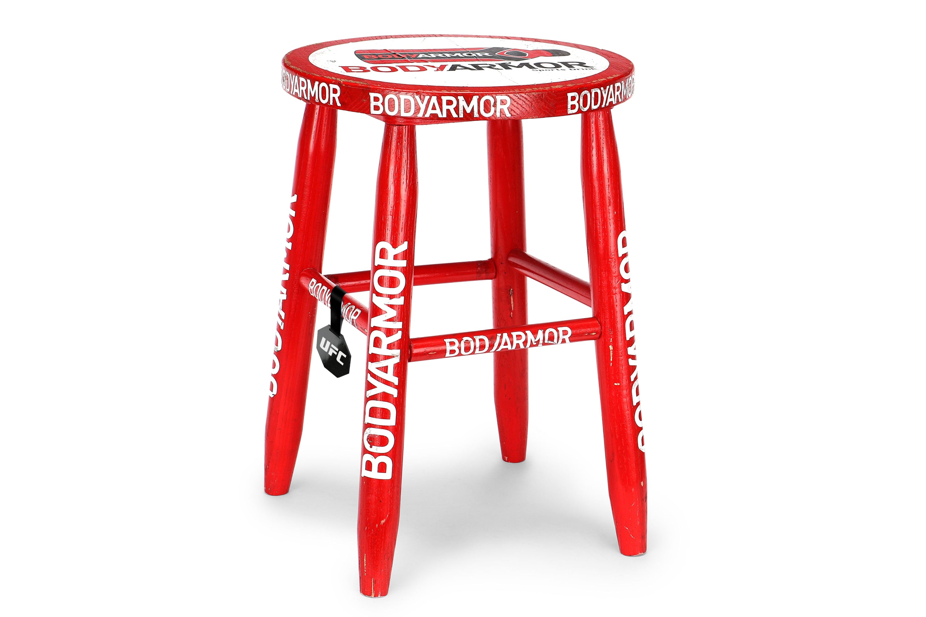 Red corner stool used at UFC Fight Night: Volkov vs. Aspinall, showcasing wear from event usage.