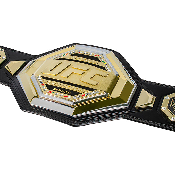 UFC Legacy Championship Replica Belt showcasing gold and silver plating with stones and flags.