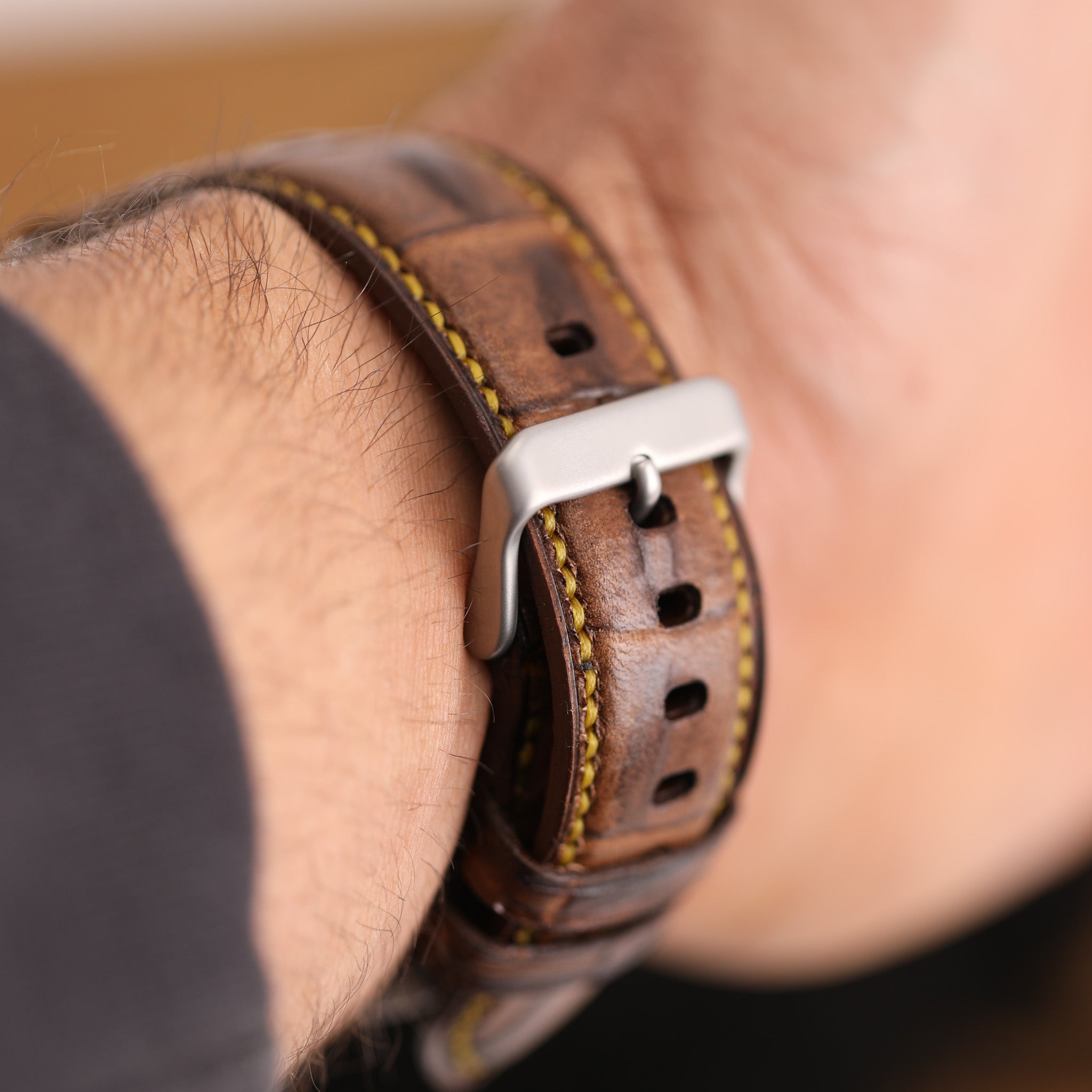 Ultra Apple Band handcrafted from genuine full grain leather with heavy duty hardware, showcasing premium finish and unique design.