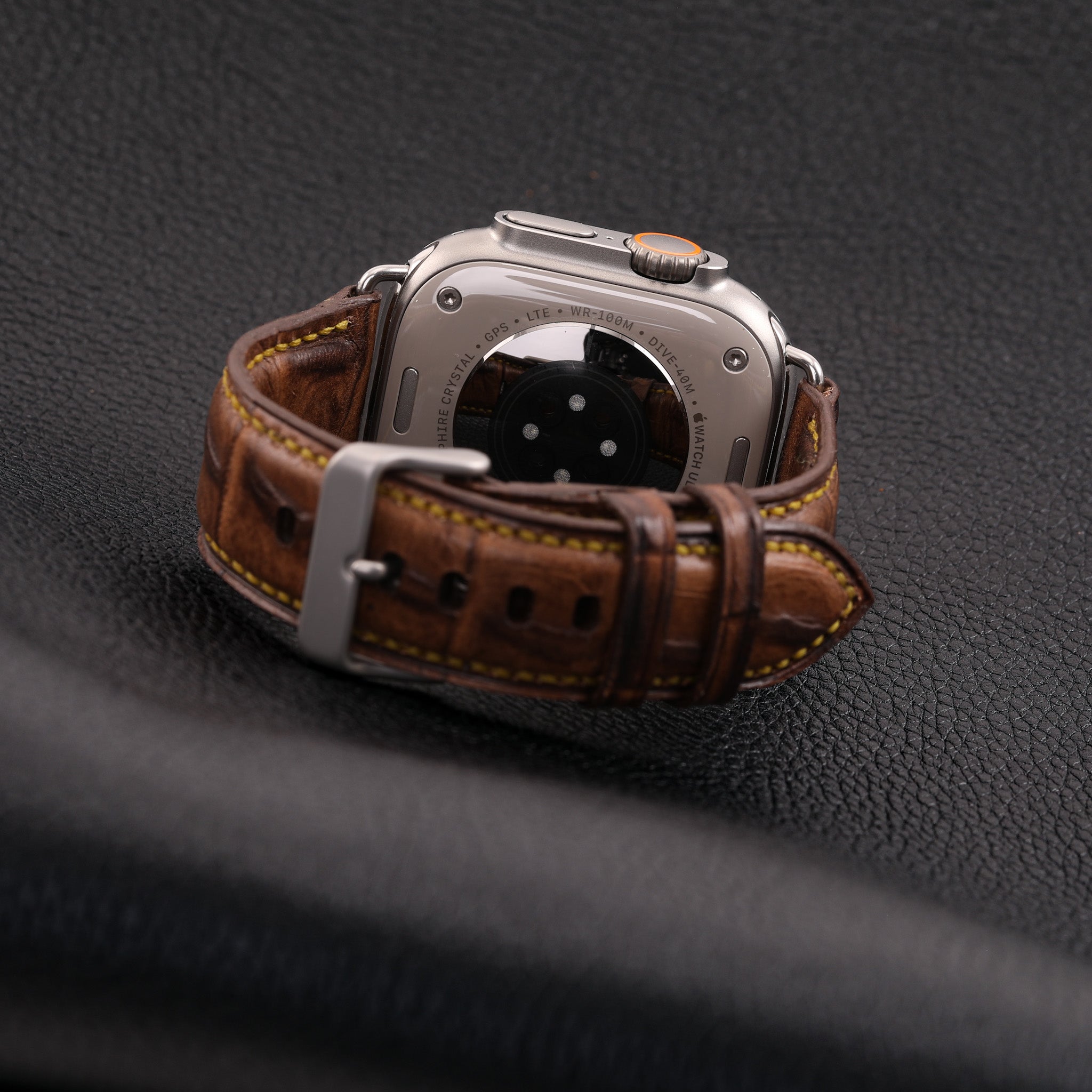 Ultra Apple Band handcrafted from genuine full grain leather with heavy duty hardware, showcasing premium finish and unique design.