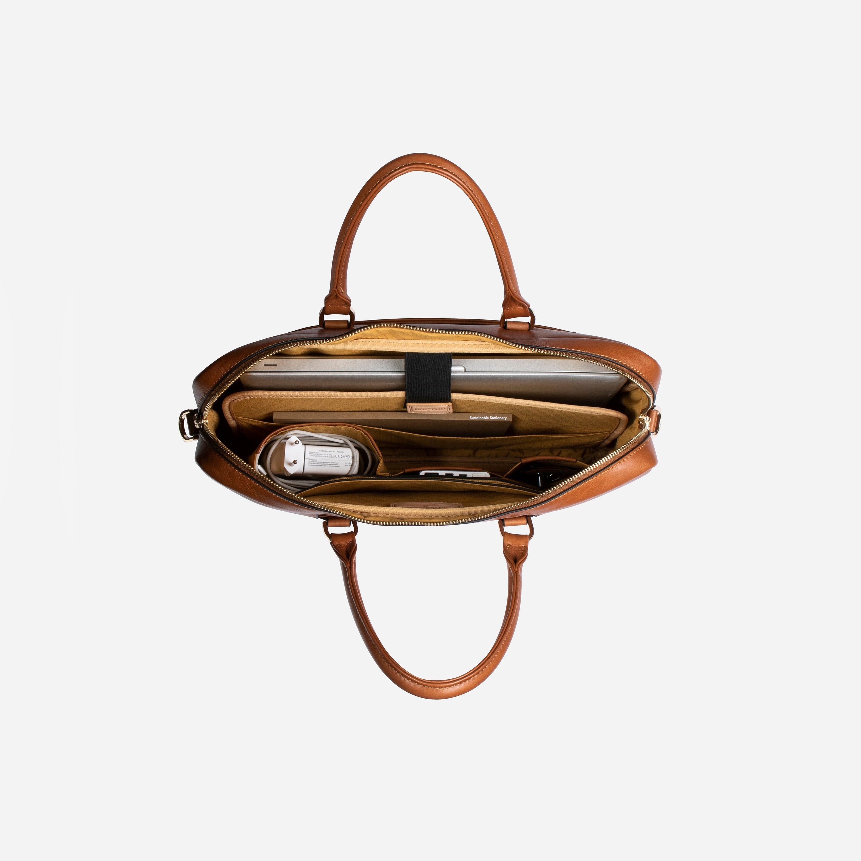 Venice Ladies Laptop Bag in Tan, featuring a sleek leather design with multiple pockets and an adjustable shoulder strap.