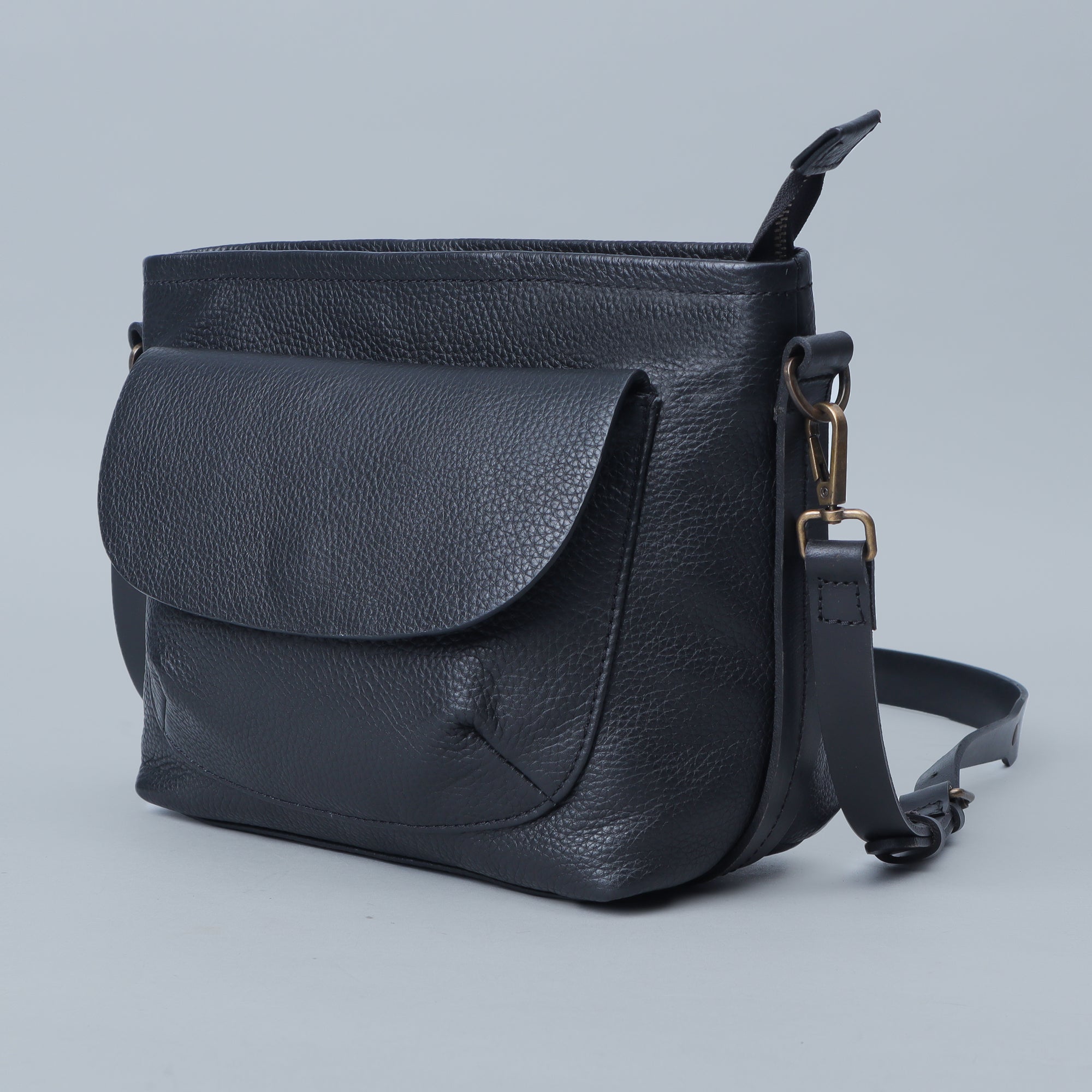 Victoria Crossbody Bag made from premium full grain leather with multiple pockets and antique brass hardware.