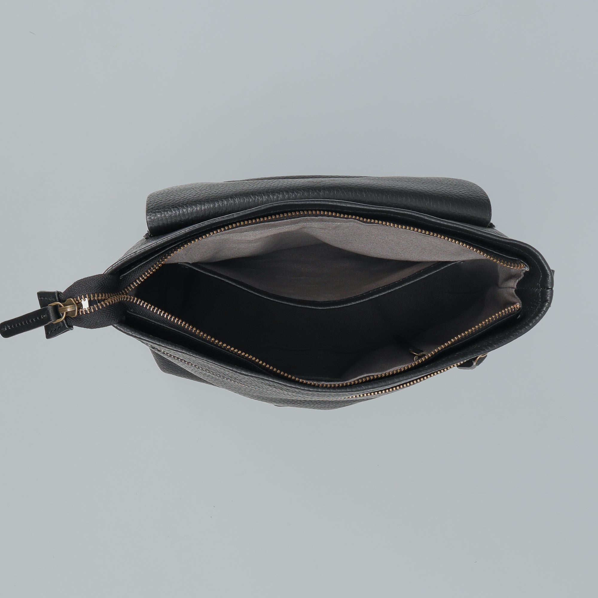 Victoria Crossbody Bag made from premium full grain leather with multiple pockets and antique brass hardware.