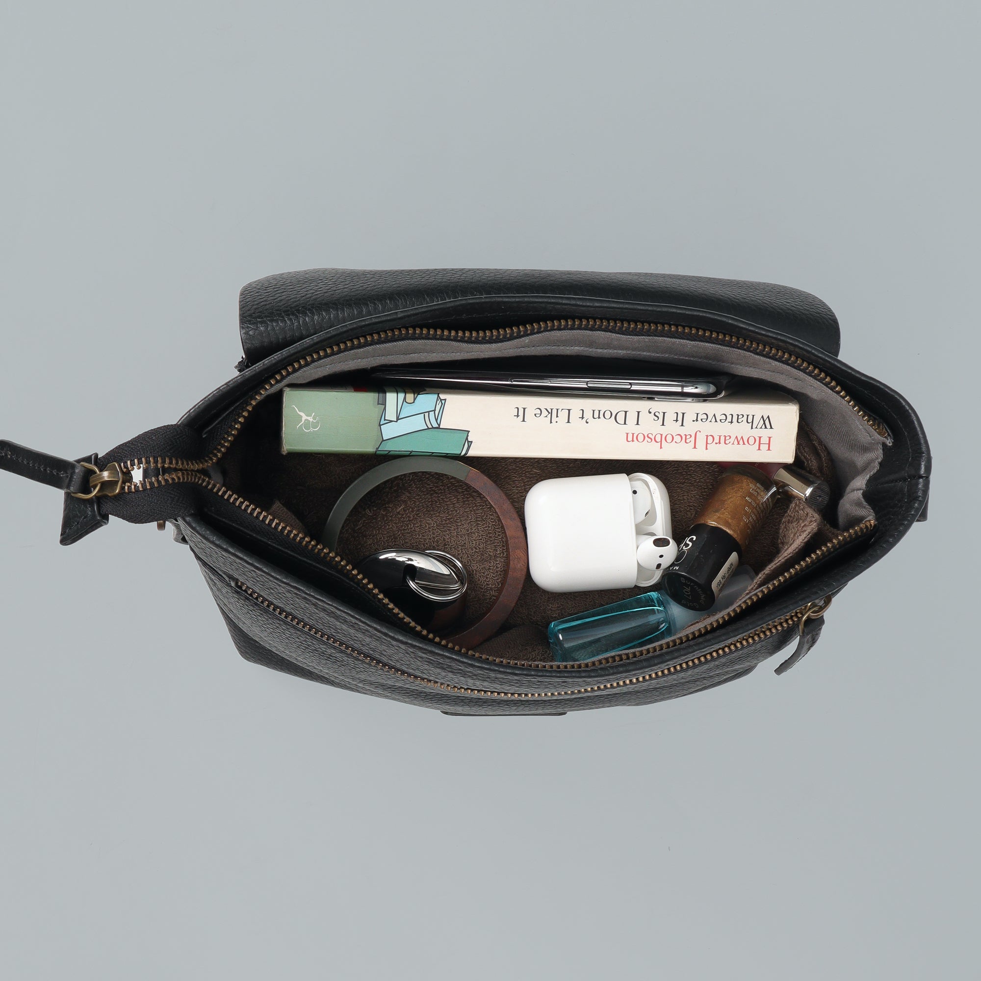 Victoria Crossbody Bag made from premium full grain leather with multiple pockets and antique brass hardware.