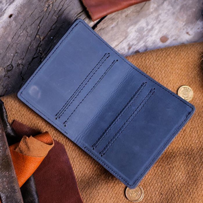 Vintage Bi-Fold Card/Cash Holder in Teal Grey, showcasing its genuine leather texture and vintage design.