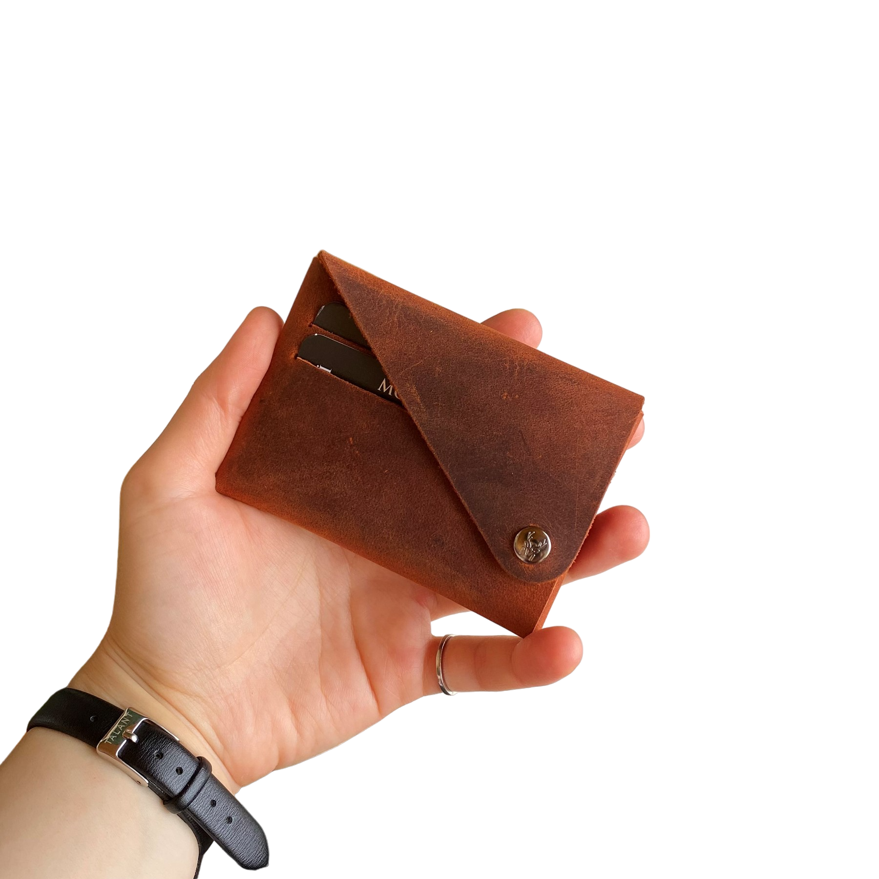 Vista Genuine Leather Folding Wallet in various colors, showcasing its thin, stitchless design and minimalistic style.