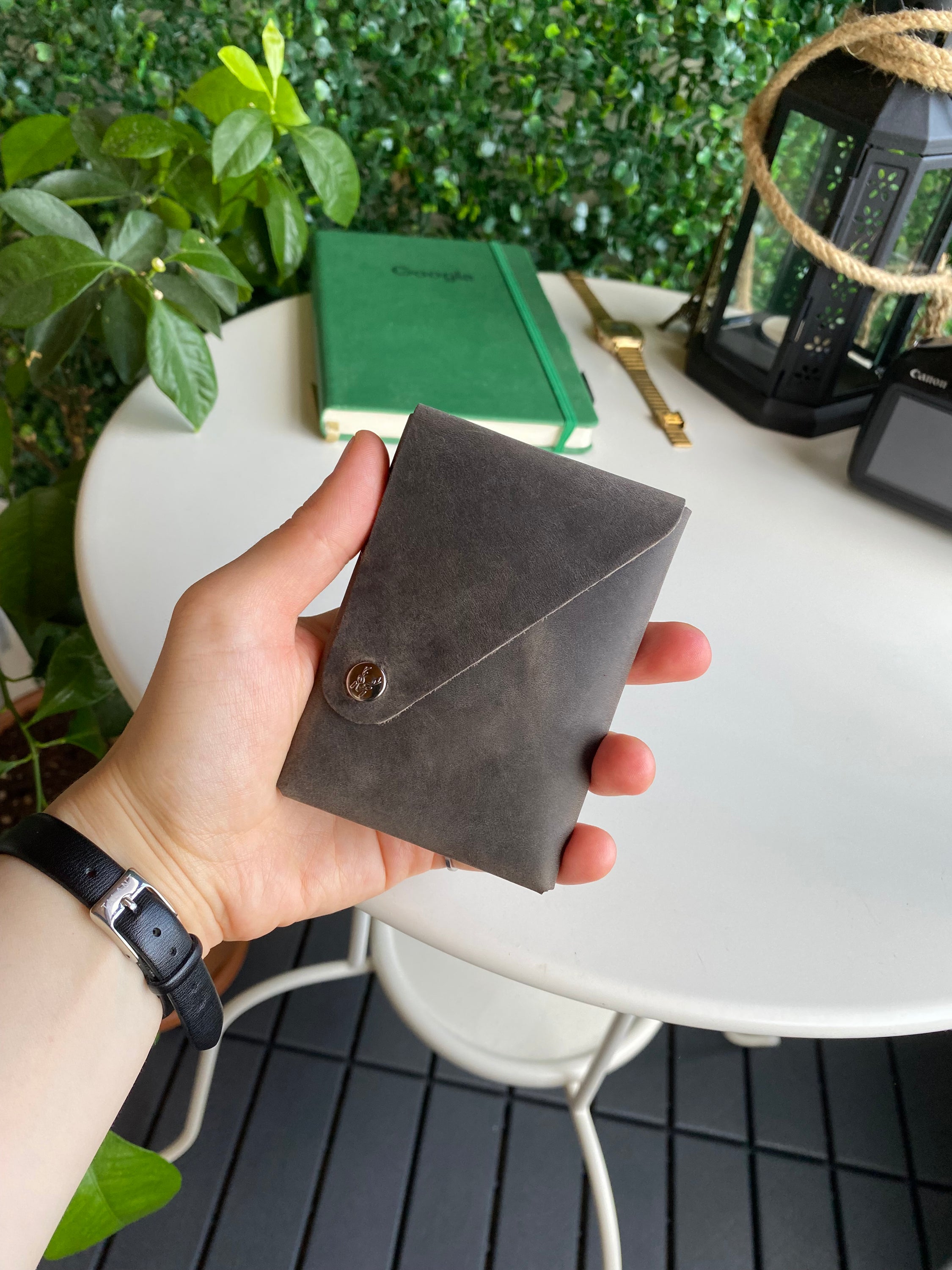 Vista Genuine Leather Folding Wallet in various colors, showcasing its thin, stitchless design and minimalistic style.