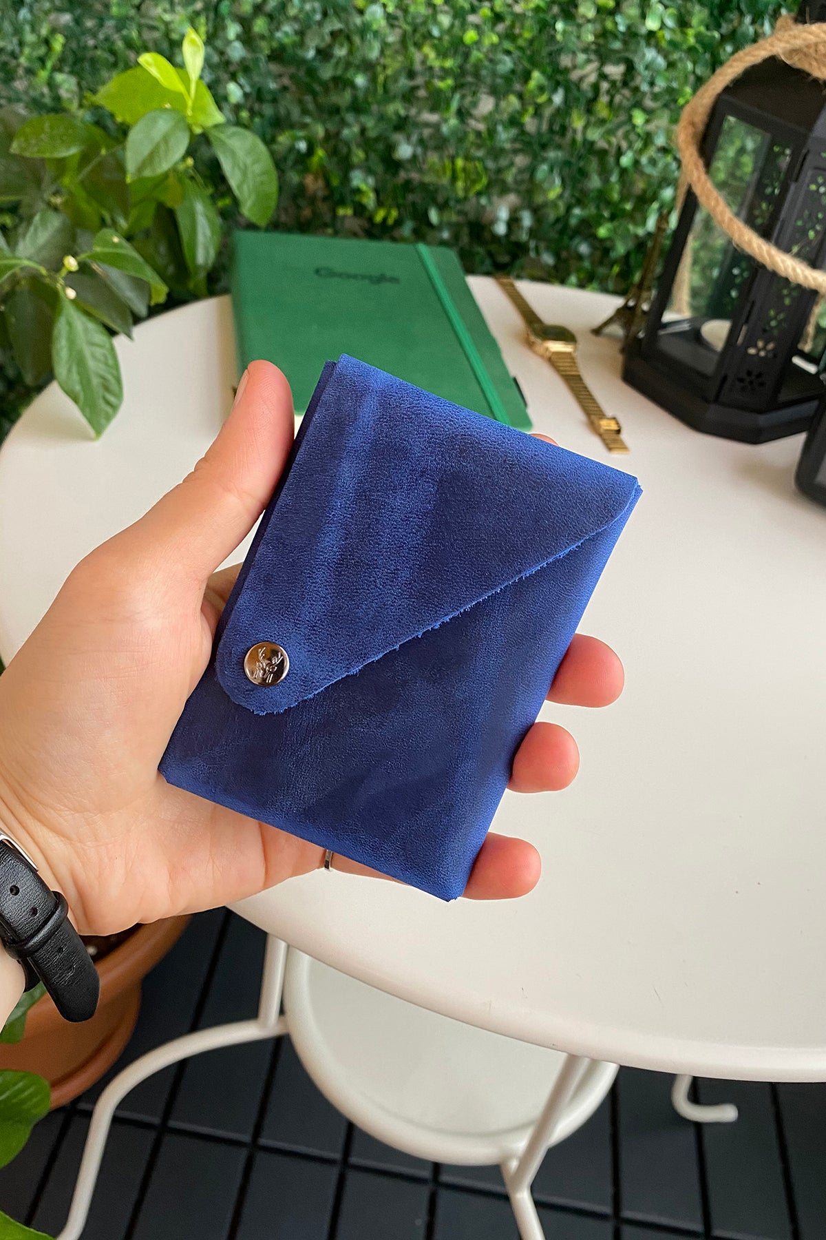 Vista Genuine Leather Folding Wallet in various colors, showcasing its thin, stitchless design and minimalistic style.