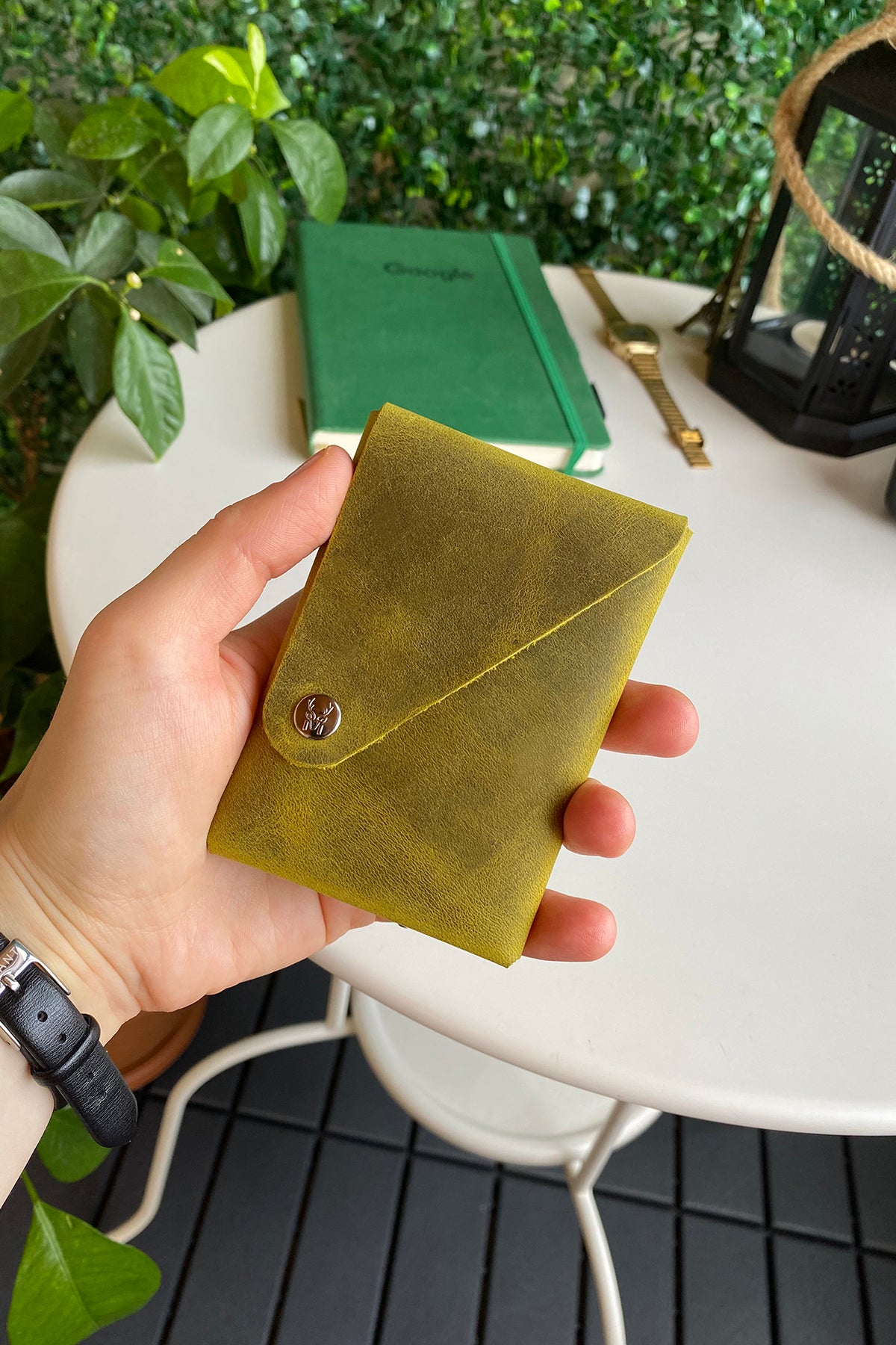 Vista Genuine Leather Folding Wallet in various colors, showcasing its thin, stitchless design and minimalistic style.