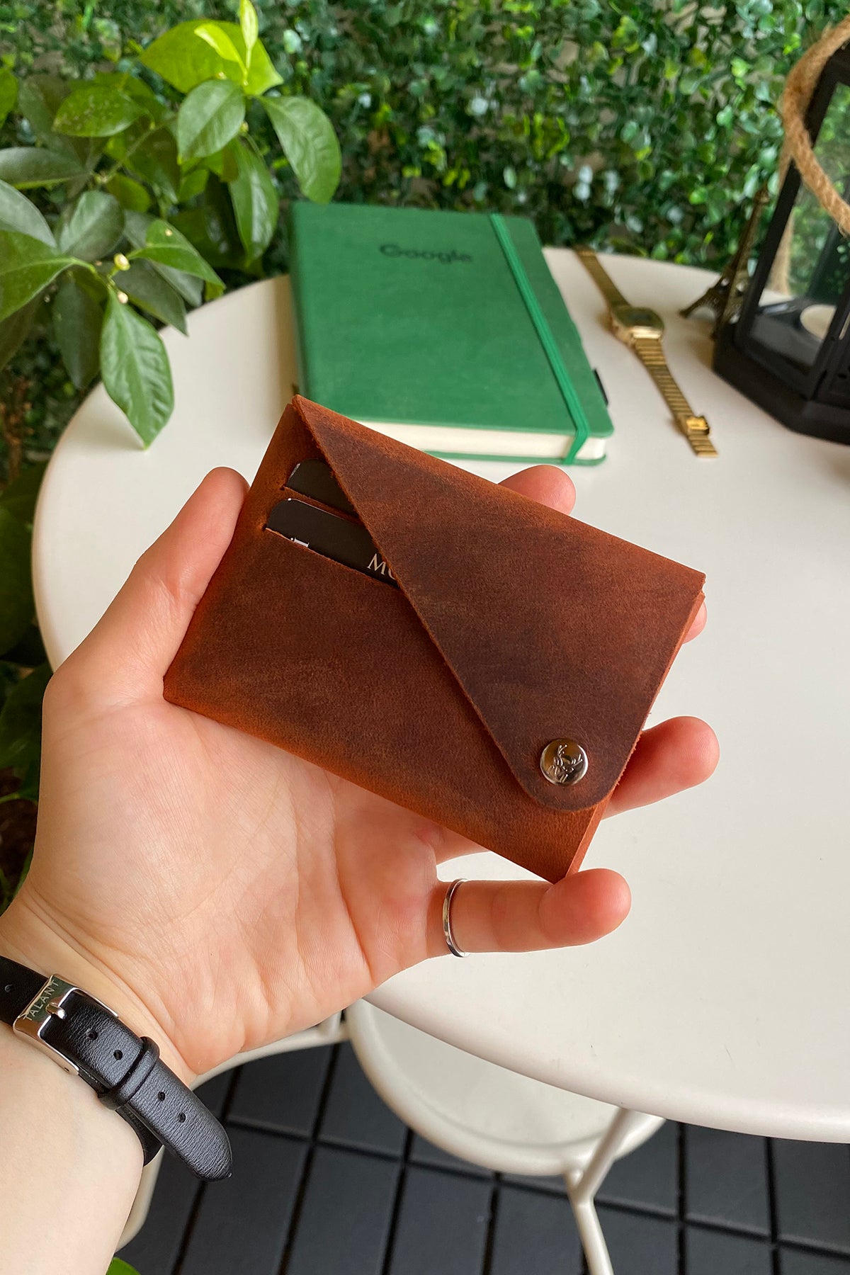 Vista Genuine Leather Folding Wallet in various colors, showcasing its thin, stitchless design and minimalistic style.