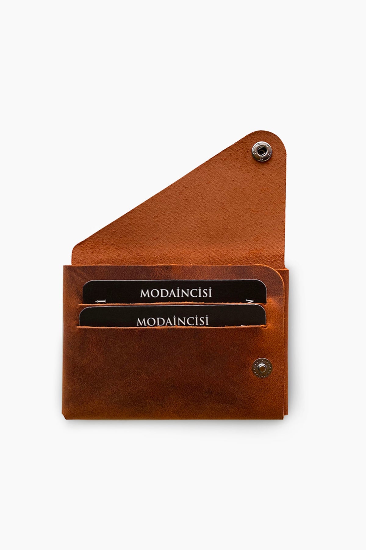 Vista Genuine Leather Folding Wallet in various colors, showcasing its thin, stitchless design and minimalistic style.