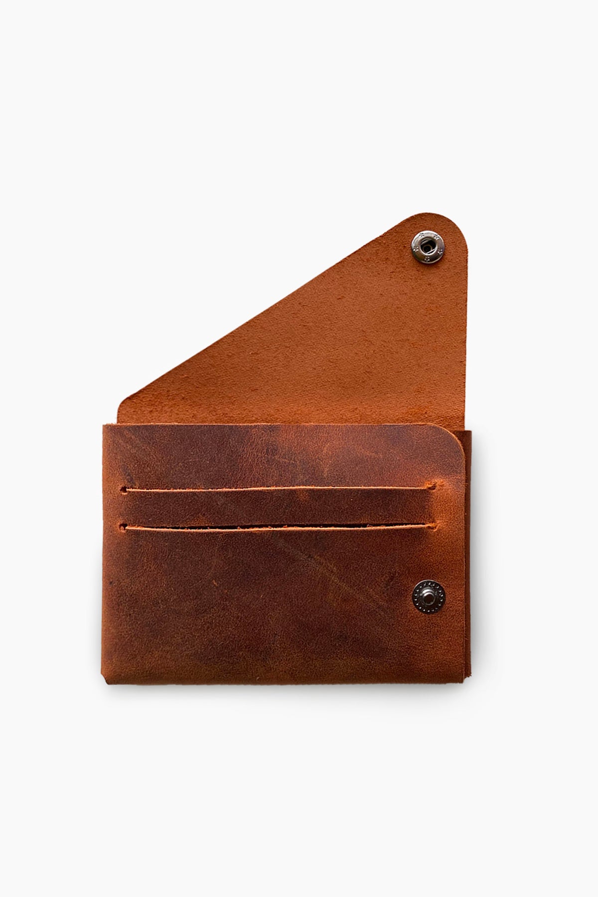 Vista Genuine Leather Folding Wallet in various colors, showcasing its thin, stitchless design and minimalistic style.