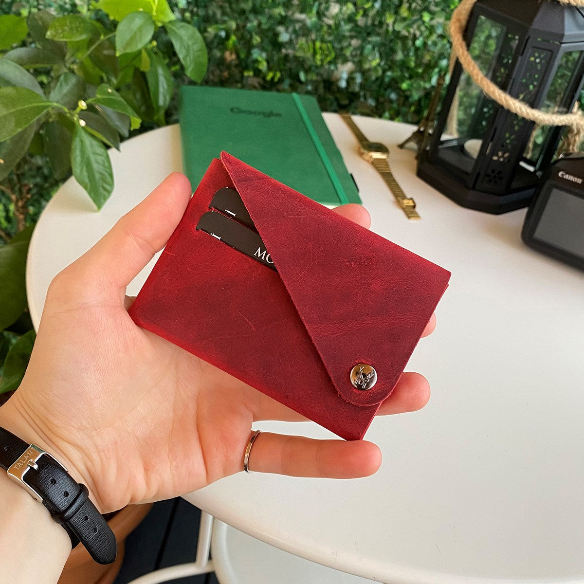 Vista Genuine Leather Folding Wallet in various colors, showcasing its thin, stitchless design and minimalistic style.