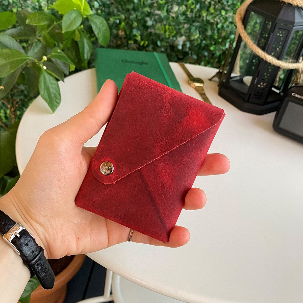 Vista Genuine Leather Folding Wallet in various colors, showcasing its thin, stitchless design and minimalistic style.