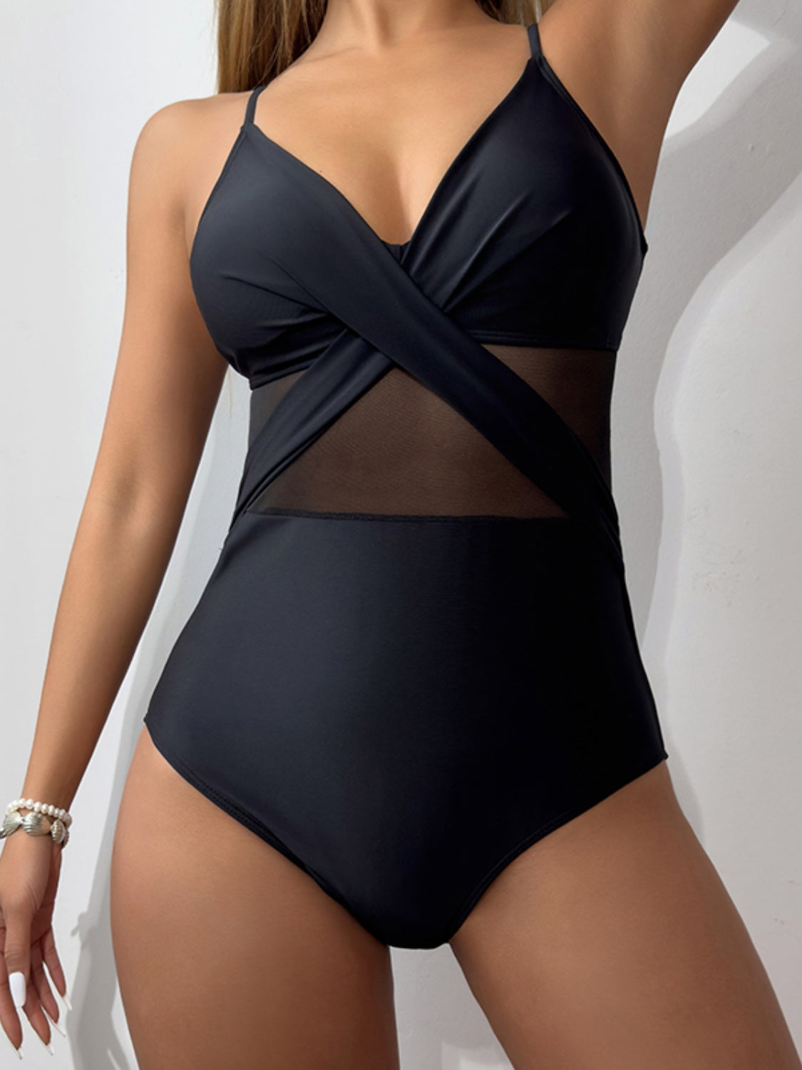 V-Neck Spaghetti Strap One-Piece Swimwear in a stylish design, featuring removable padding and a comfortable fit.