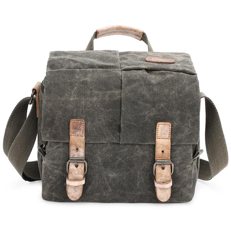 Waterproof canvas camera messenger bag for men, featuring batik canvas and cowhide, designed for photography and travel.