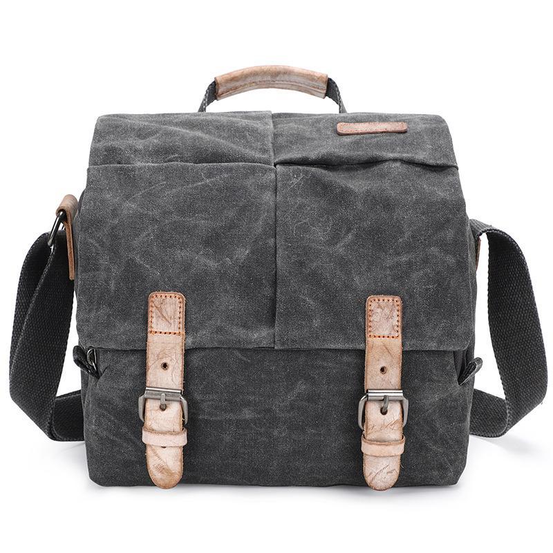 Waterproof canvas camera messenger bag for men, featuring batik canvas and cowhide, designed for photography and travel.