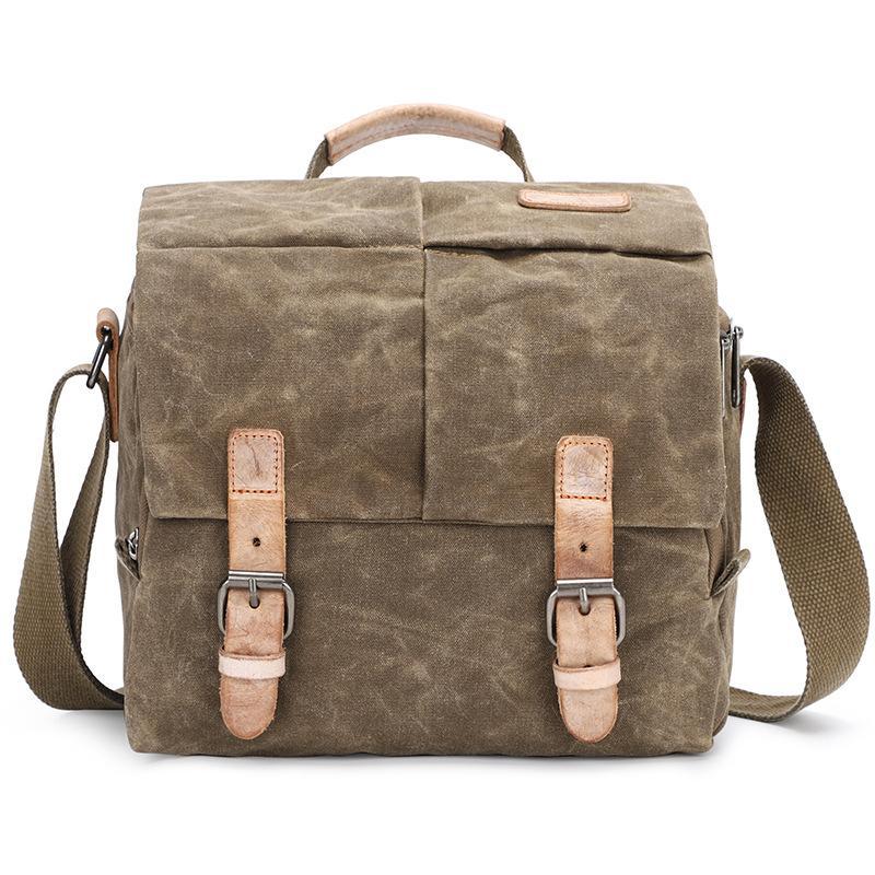 Waterproof canvas camera messenger bag for men, featuring batik canvas and cowhide, designed for photography and travel.