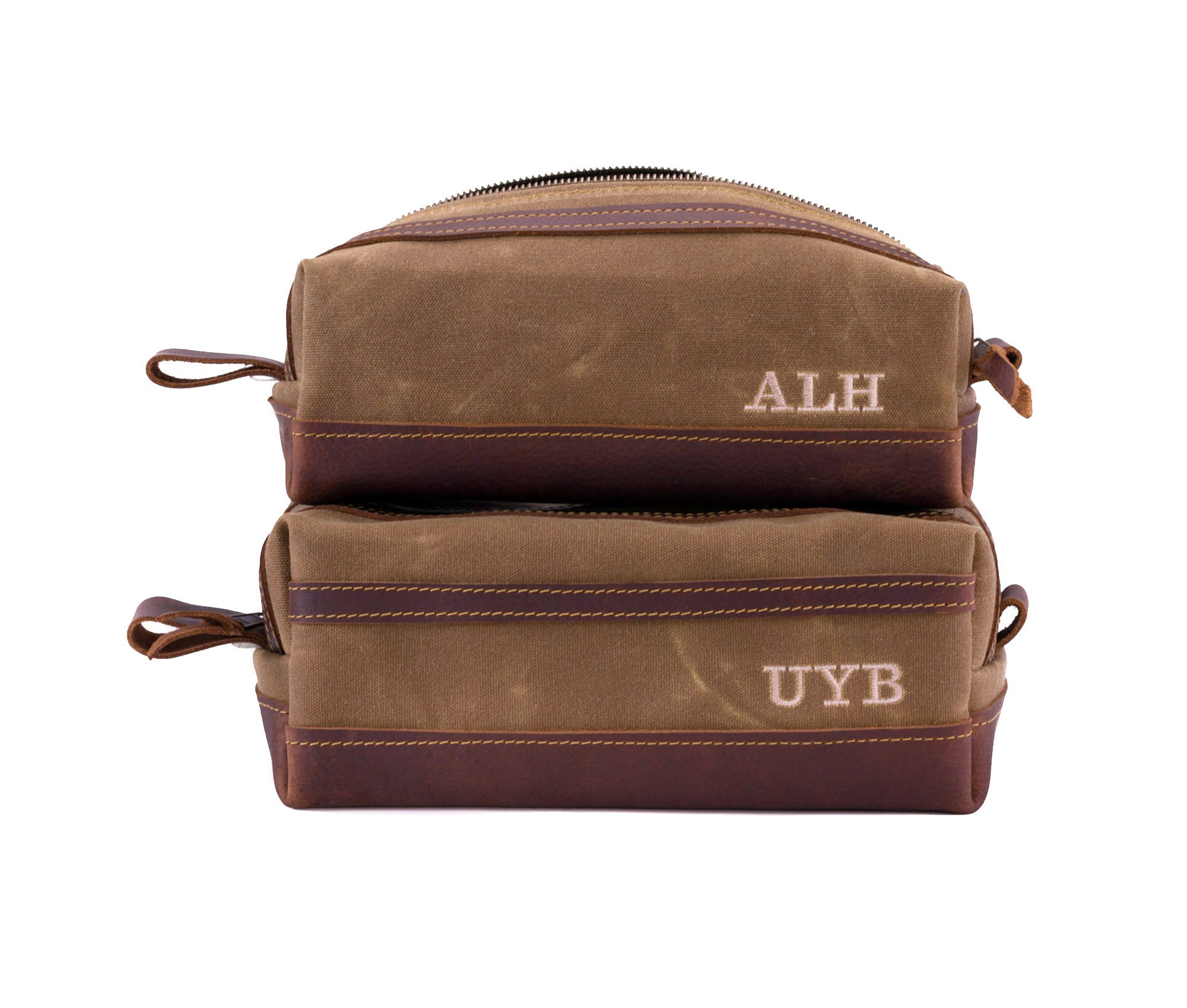 Waxed Canvas Toiletry Bag featuring leather accents, water-resistant liner, and heavy-duty zipper, ideal for travel and everyday use.