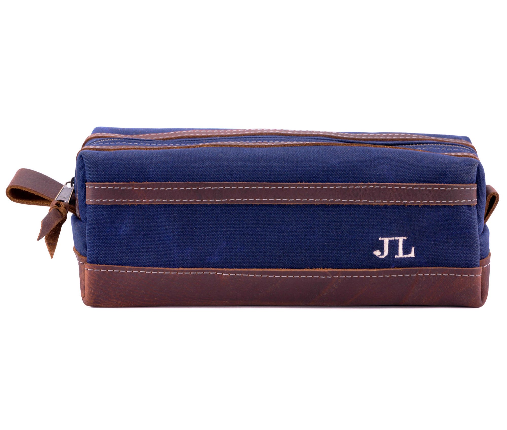 Waxed Canvas Toiletry Bag featuring leather accents, water-resistant liner, and heavy-duty zipper, ideal for travel and everyday use.