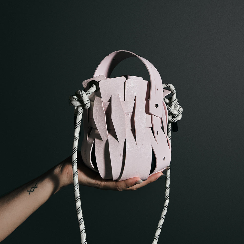 Weaveasy Dome Bag with colorful straps and adjustable design, showcasing its unique customization features.