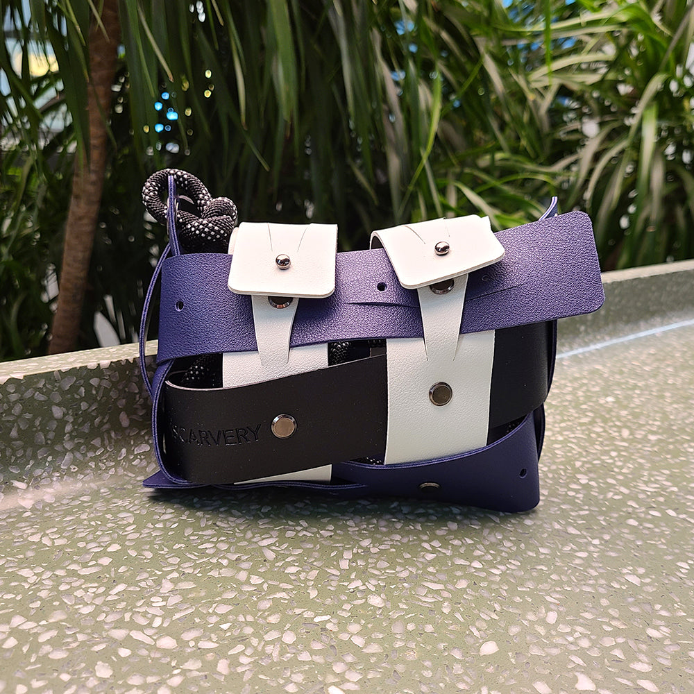 Weaveasy Mini Bag with colorful straps and adjustable design, featuring a DiSCARVERY pouch and white rope.