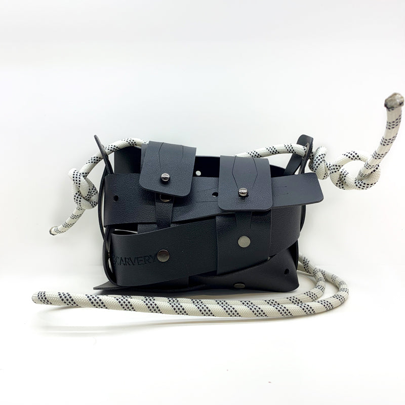 Weaveasy Mini Bag with colorful straps and adjustable design, featuring a DiSCARVERY pouch and white rope.