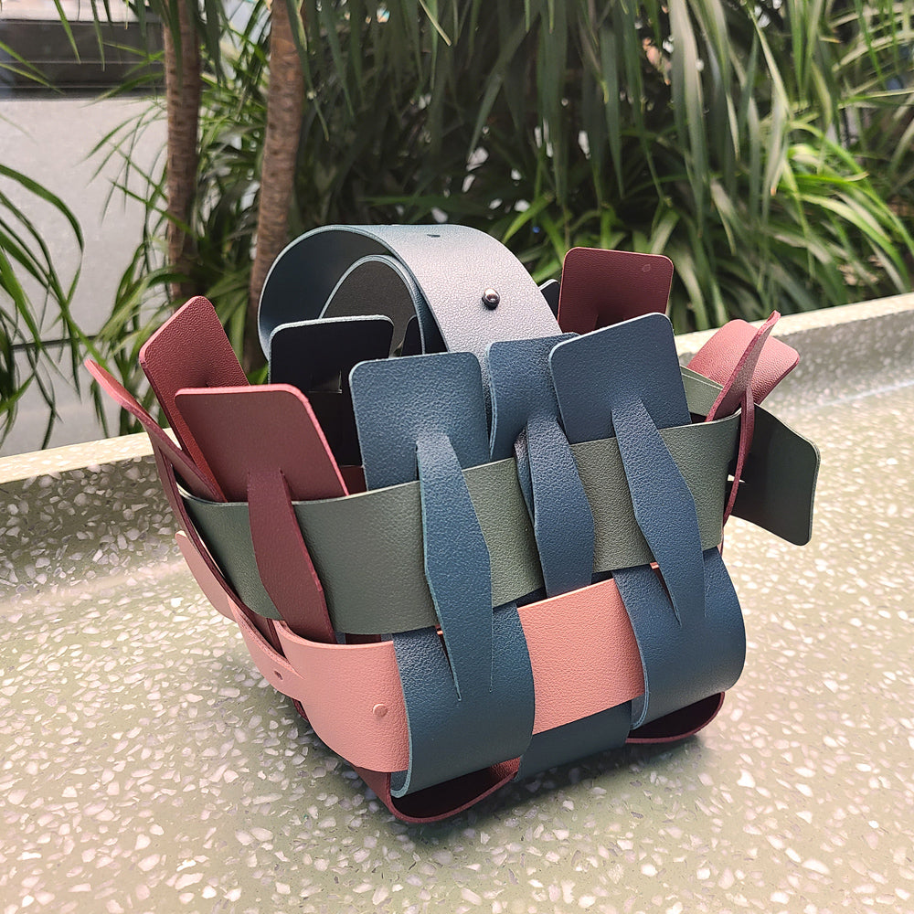 Weaveasy Mini Cube Bag with colorful straps and adjustable strap, showcasing its unique design and compact size.