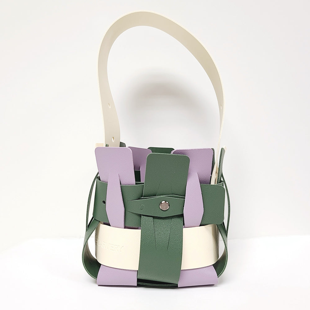 Weaveasy Mini Cube Bag with colorful straps and adjustable strap, showcasing its unique design and compact size.